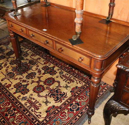 Early Victorian mahogany three drawer side table